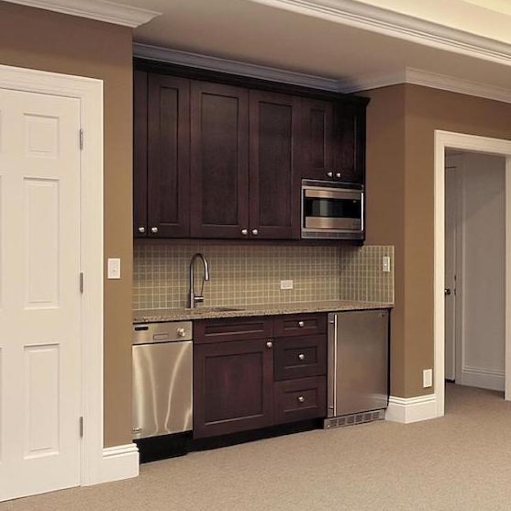 Basement in new construction home with bar